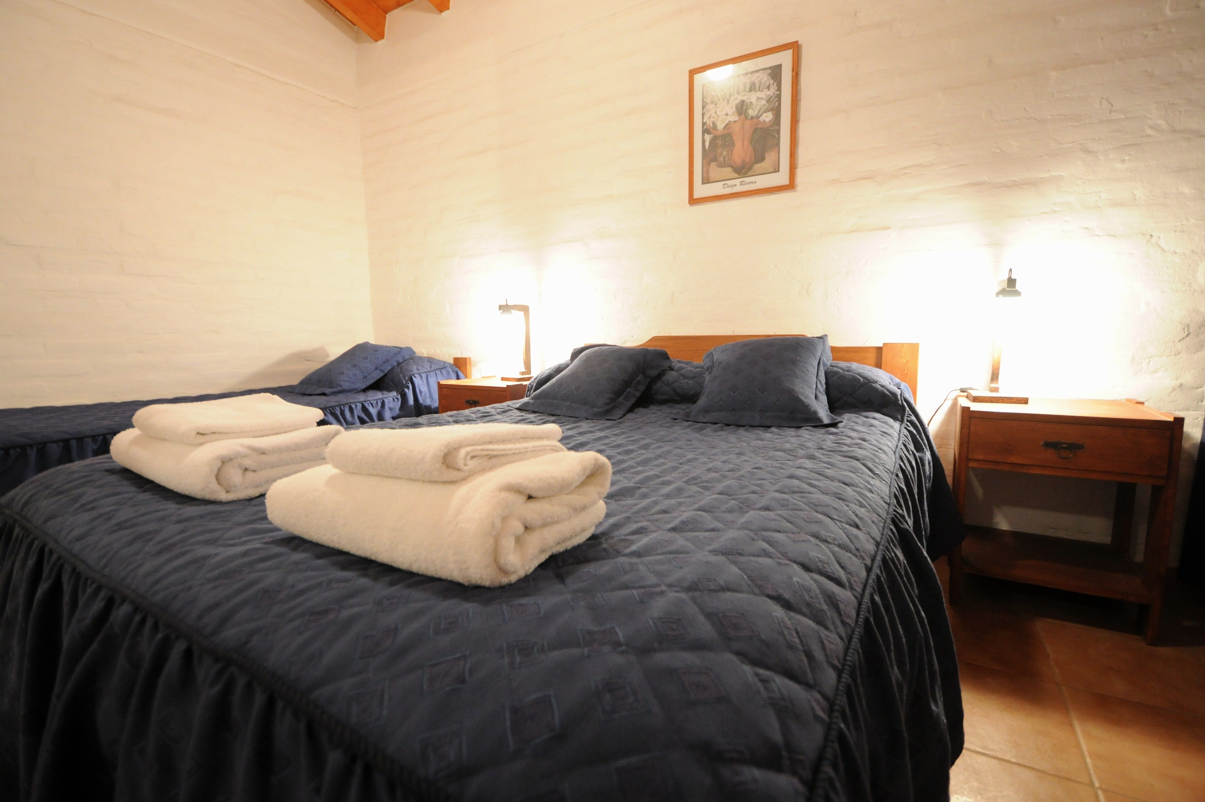 Dormitorio de la Cabaña Valle Pintado con cama doble